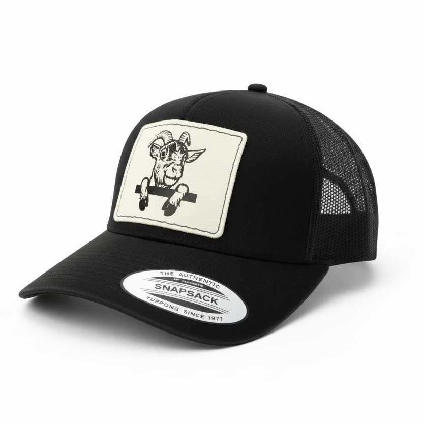 Black trucker cap with a patch featuring a goat and text on a white background