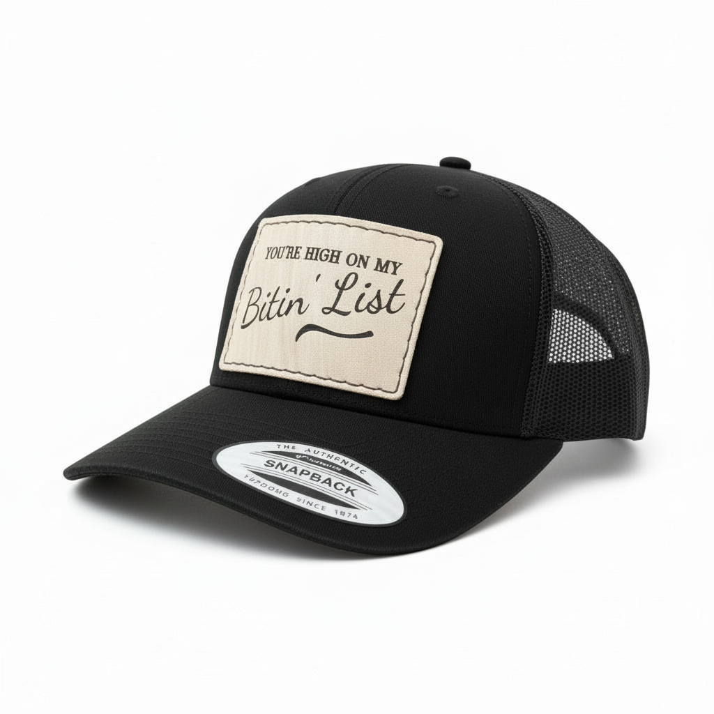Black trucker cap with a beige patch and text on a white background