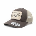 brown hat with a leather hat patch that says you're high on my bitin' list