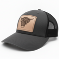 Black cap with brown leather patch featuring a bull's head on a white background