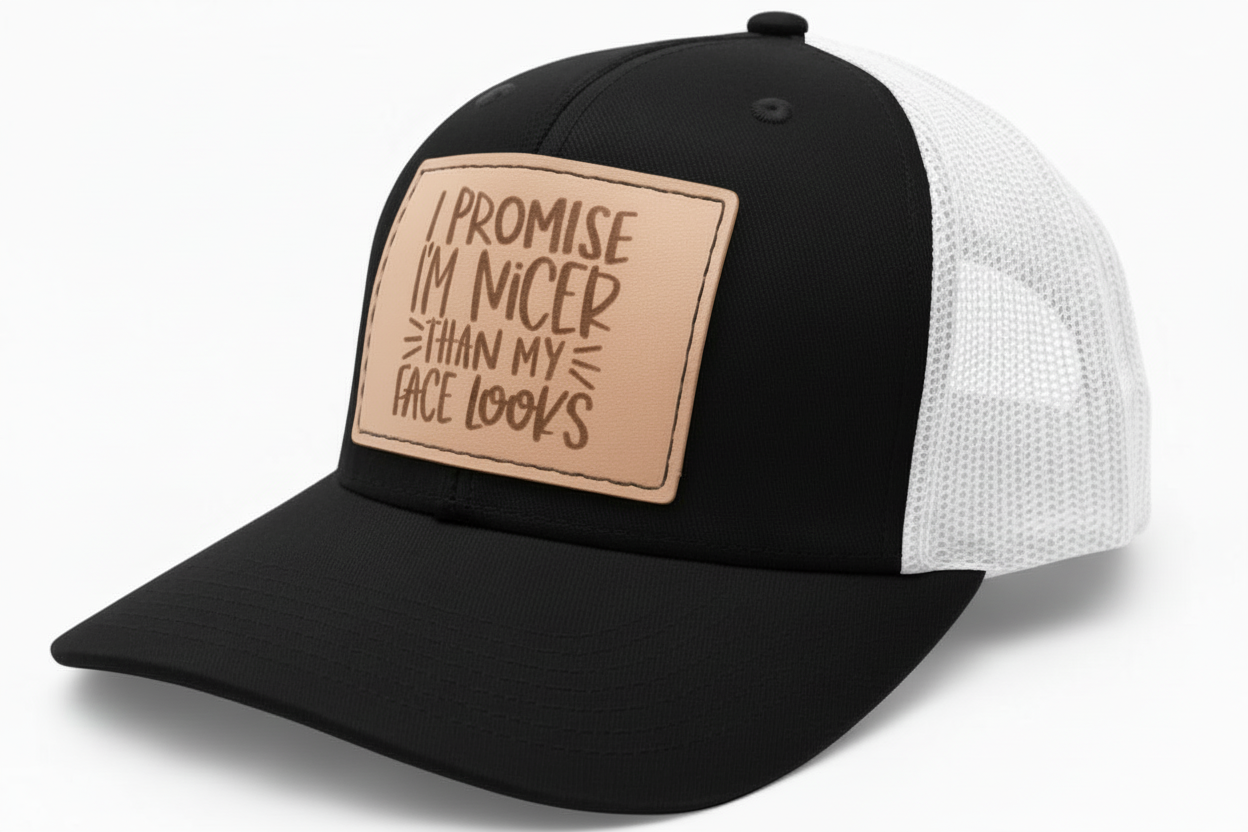 Black trucker cap with a tan patch featuring text on a white background