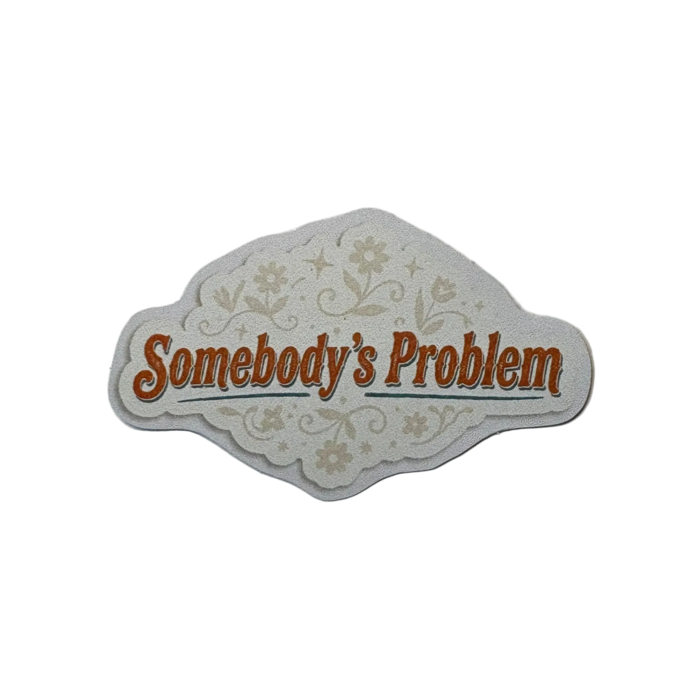 Decorative sign with 'Somebody's Problem' text on a white background